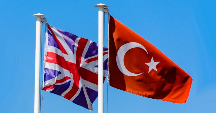 Turkish, British UK and Greek flags flying together
