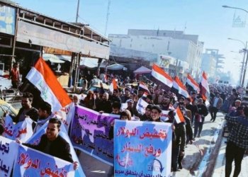 ل به‌غدا خۆنیشاندان ل دژی بلندبوونا بهایێ دۆلاری هاتنه‌ كرن