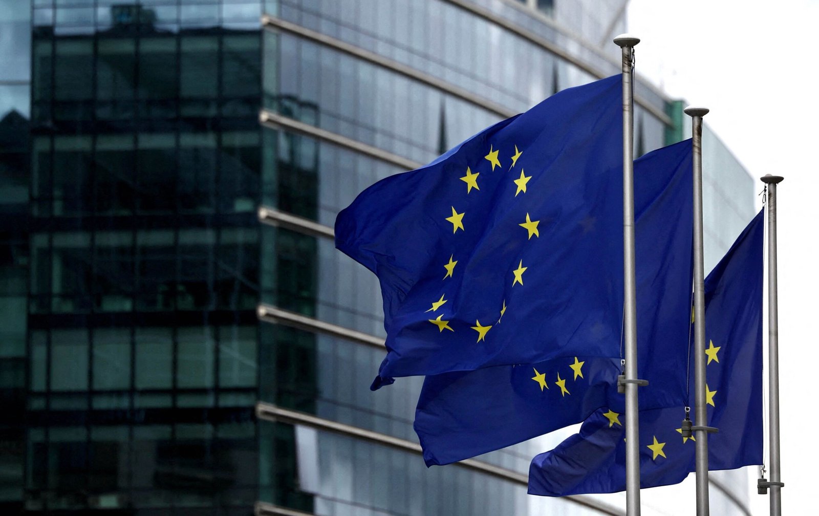 FILE PHOTO: European flags fly outside the European Commission headquarters in Brussels, Belgium September 20, 2023. REUTERS/Yves Herman/File Photo